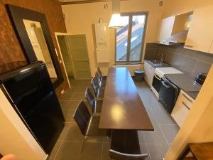 Kjøkken eller kjøkkenkrok på J and R Brussels City Apartment