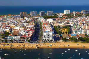 an aerial view of a beach and a city at Hotel Emilio in Punta Umbría
