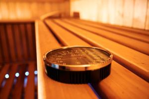 a watch sitting on top of a bowling alley at Unterpetersbächlerhof in Fischbach bei Dahn