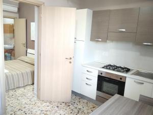 A kitchen or kitchenette at B&B Da Luca Még 31 kép