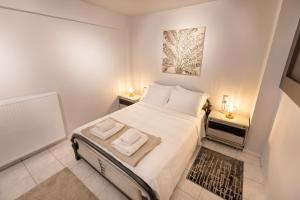 Postel nebo postele na pokoji v ubytování Oikion Meteora Home 1