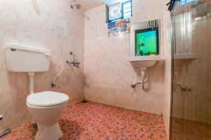 Koupelna v ubytování Kiara Hotel Goa + 25 fotografií