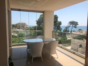 Apartamento en primera línea de la playa con vistas al mar ...