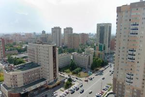 an aerial view of a city with buildings and cars at Central Apartament near by Marriott hotel in Novosibirsk