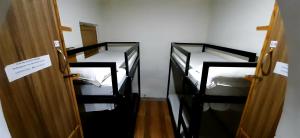 Postel nebo postele na pokoji v ubytování Comfort Stay Hostel