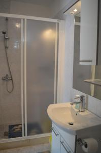 Kúpeľňa v ubytovaní Rooms & Apartments Kvasić