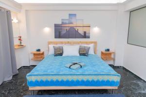 מיטה או מיטות בחדר ב-AS SUITES ROOM 14