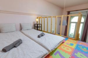 Posteľ alebo postele v izbe v ubytovaní Budapest Three Cats Hostel