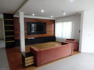 Η κουζίνα ή μικρή κουζίνα στο Conforto em Campos +5 φωτογραφίες
