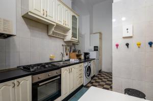 Kuchyňa alebo kuchynka v ubytovaní Budapest Three Cats Hostel