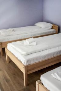 Postel nebo postele na pokoji v ubytování Sunset Hotel