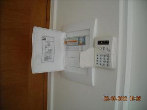 a white refrigerator with a phone inside of it at Departamento Viña del Mar Viana in Viña del Mar