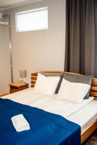 Postel nebo postele na pokoji v ubytování Sunset Hotel