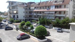 a parking lot in front of a building at Appartamento Pitagora in Scalea