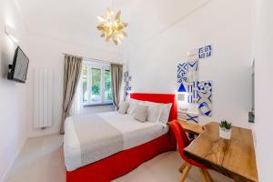 Säng eller sängar i ett rum på Monte Brusara Relais