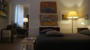 A bed or beds in a room at L'appartamentino