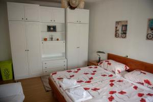 Postel nebo postele na pokoji v ubytování Apartman Peric