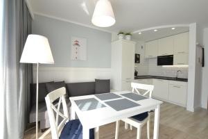 Dapur atau dapur kecil di Darłówko Apartament Morski VIII