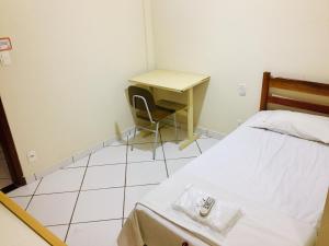Postel nebo postele na pokoji v ubytování Hotel Oliveira