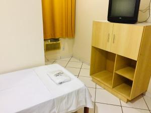 TV a/nebo společenská místnost v ubytování Hotel Oliveira