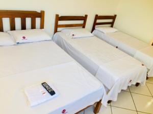 Postel nebo postele na pokoji v ubytování Hotel Oliveira