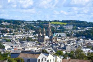 an aerial view of a city with a church at Donnington Guesthouse in Truro