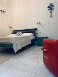 Postel nebo postele na pokoji v ubytování Don Ferdinando