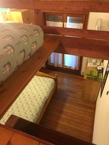 Postel nebo postele na pokoji v ubytování Agriturismo Luloc