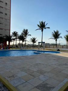 A piscina localizada em Apartamento em Fortaleza em frente a praia do Futuro ou nos arredores