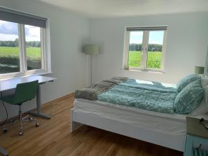Postel nebo postele na pokoji v ubytování Field View B&B