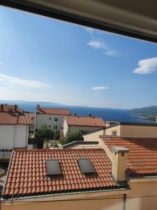 a view of the roofs of a building at Guest House Mare e Monti in Rabac