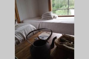 Cama o camas de una habitación en Rinconcito - Casa de descanso y río en Punta Gorda, Uruguay