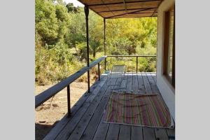 En balkon eller terrasse på Rinconcito - Casa de descanso y río en Punta Gorda, Uruguay