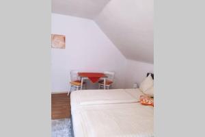 Posteľ alebo postele v izbe v ubytovaní Gemütliches Ferienhaus am Waldrand