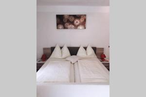 Posteľ alebo postele v izbe v ubytovaní Gemütliches Ferienhaus am Waldrand