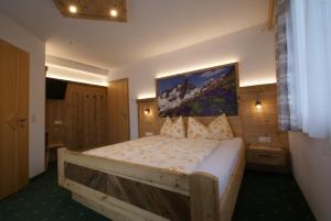 Una cama o camas en una habitación de Ferienwohnung Bergheim