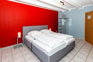 Postel nebo postele na pokoji v ubytování Apart Hotel Sarstedter Hof