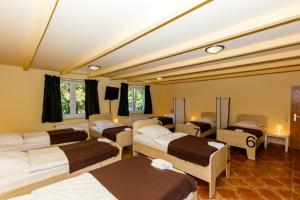 Postel nebo postele na pokoji v ubytování Apart Hotel Sarstedter Hof