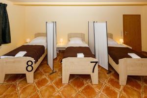 Postel nebo postele na pokoji v ubytování Apart Hotel Sarstedter Hof