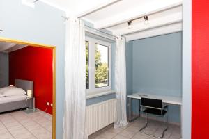 Postel nebo postele na pokoji v ubytování Apart Hotel Sarstedter Hof