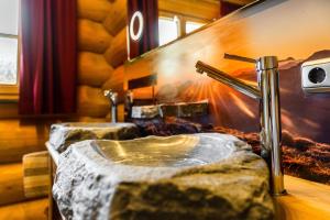 Postel nebo postele na pokoji v ubytování Alpenchalet St.Ulrich