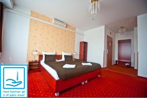 Posteľ alebo postele v izbe v ubytovaní Canada Hotel Budapest