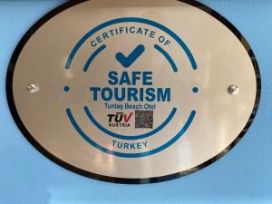 Certifikát, hodnocení, plakát nebo jiný dokument vystavený v ubytování Tuntas Family Suites Kusadasi