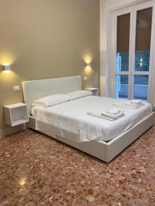 Postel nebo postele na pokoji v ubytování THE NEST - B&B - Suites