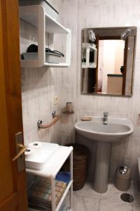 Ett badrum på Appartamento Corralejo