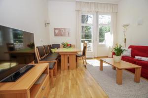 A television and/or entertainment centre at Residence Diana