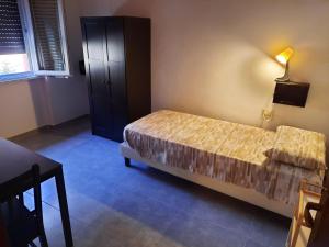 Postel nebo postele na pokoji v ubytování B&B Confine