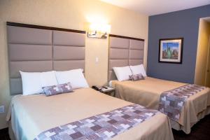 Postel nebo postele na pokoji v ubytování 7 Days Hotel + 28 fotografií