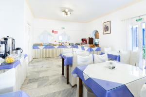 A restaurant or other place to eat at Gardenia Hotel