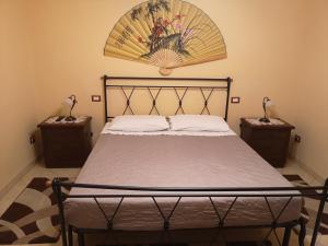 Postel nebo postele na pokoji v ubytování Guest house le grazie